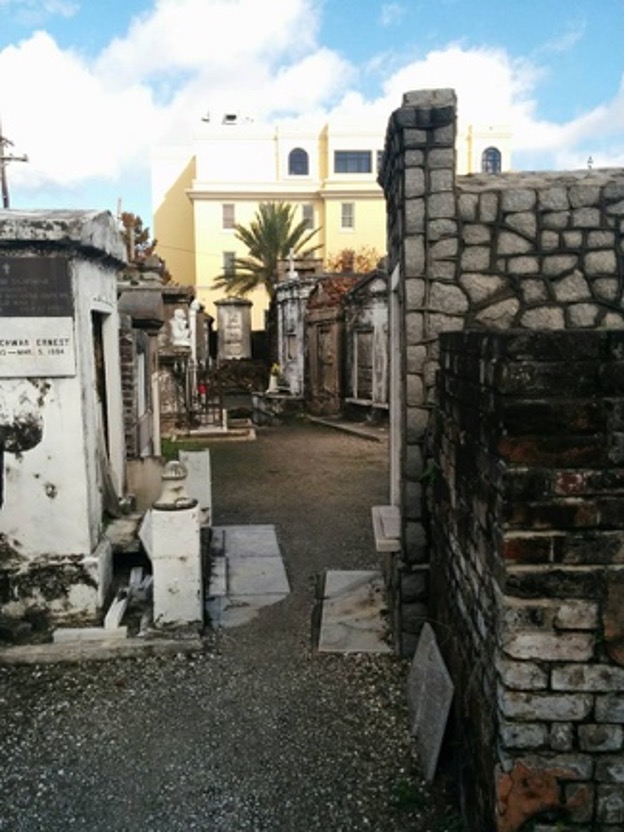 Image of St. Louis Cemetery No. 1, New Orleans, Louisiana showing tall above ground, unlimited tombs.