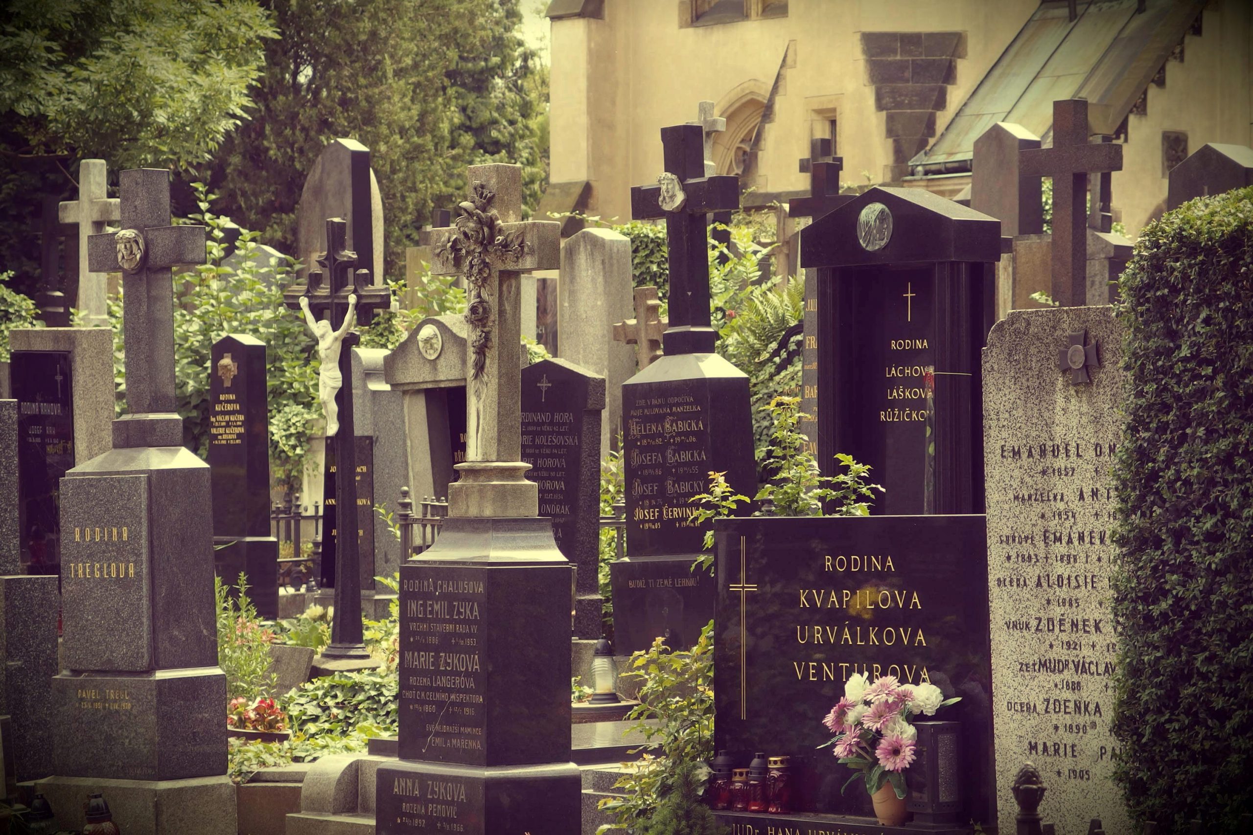crowded cemetery with limited room between plots