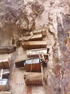 Igorot hanging coffins on cliff side in the Philippines