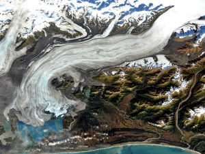 Figure 16.29 Part of the Bering Glacier in southeast Alaska, the largest glacier in North America. It is about 14 km across in the centre of this view. [http://water.usgs.gov/edu/gallery/glacier-satellite.html]