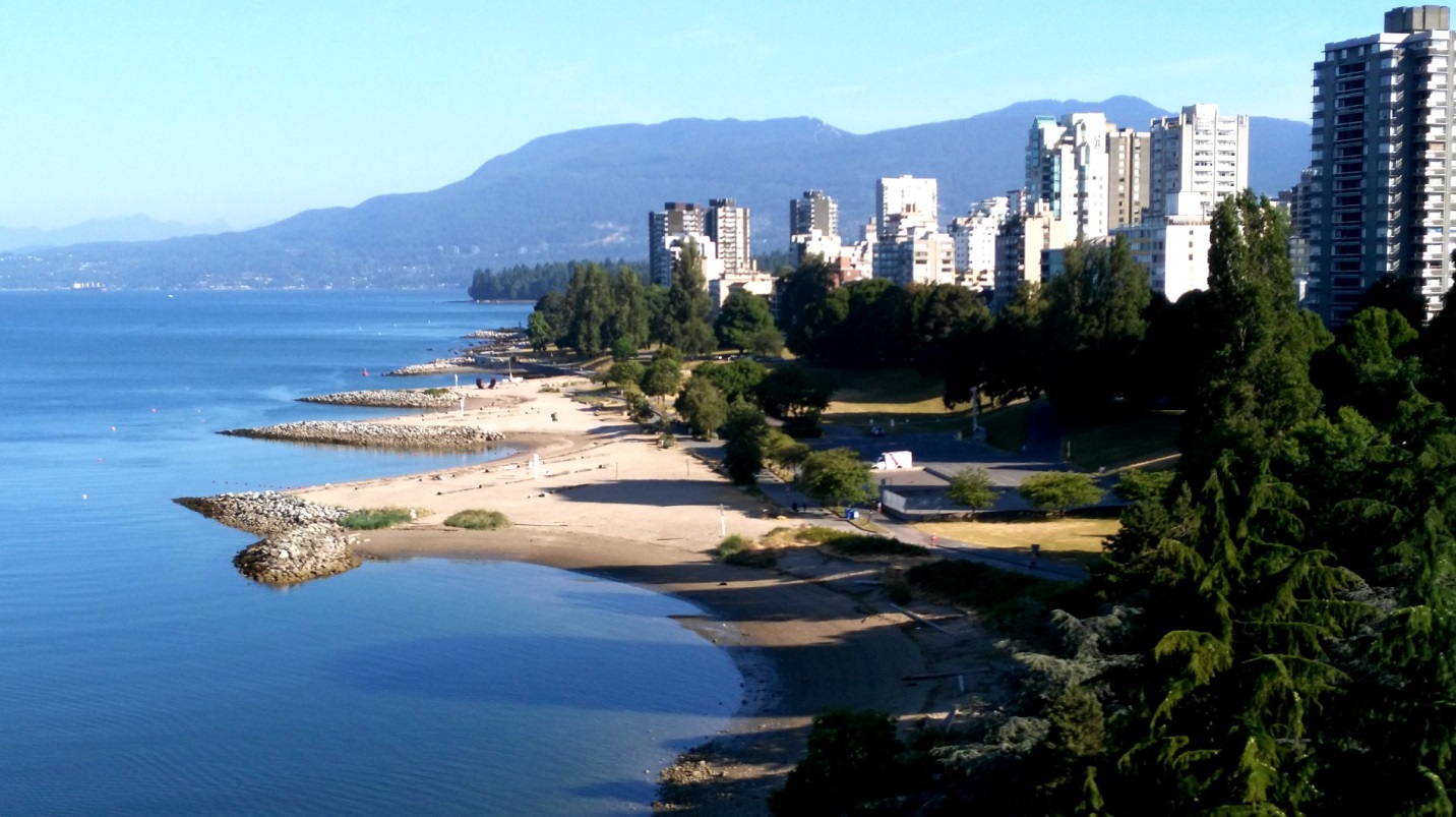 Figure 17.30 Photograph of the impact of breakwaters on beach development at Sunset Beach, Vancouver [by Isaac Earle, used with permission]