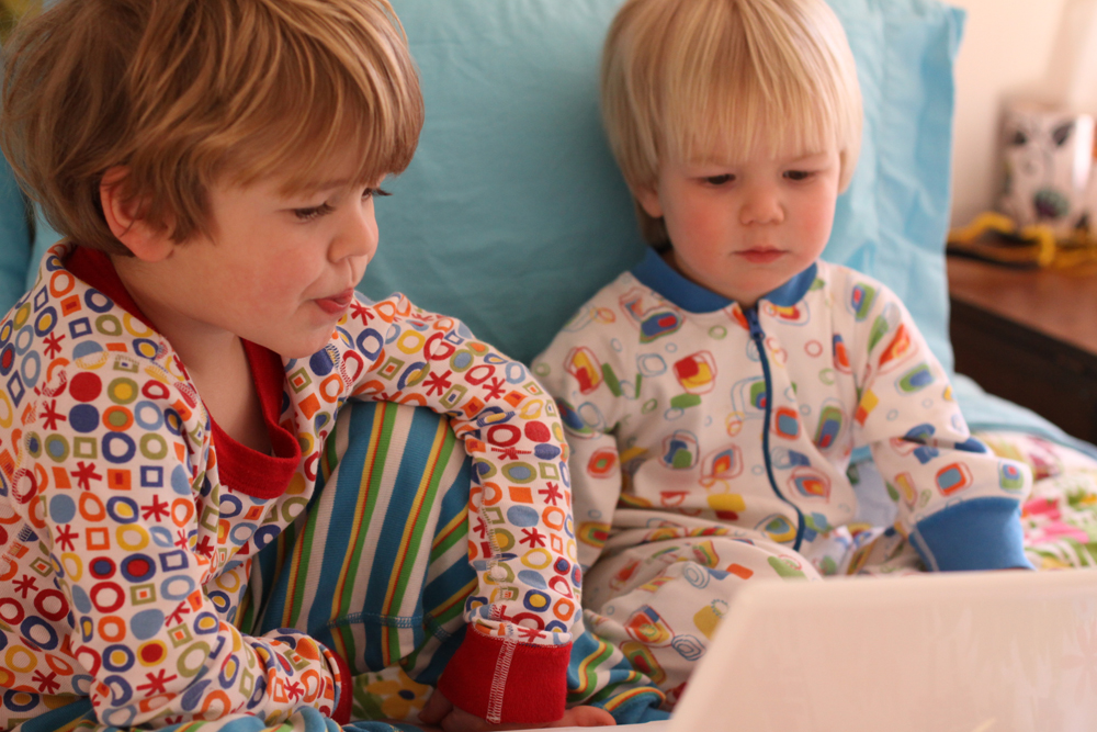 two boys wearing pajamas made by Hanna Andersson Corporation
