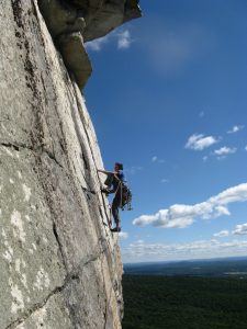 rock climber scaling a wall
