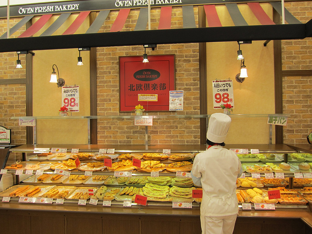 A chef at the bakery section of a supermarket