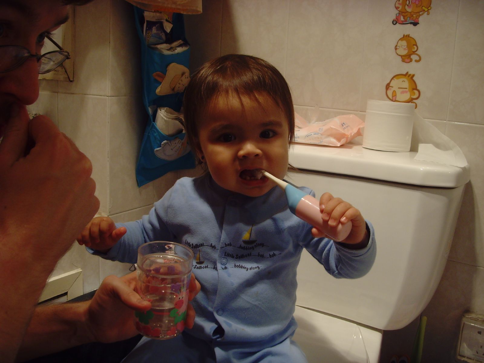 one year-old brushing their teeth
