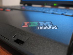 close up of IBM think pad written on laptop