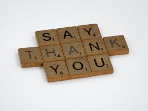 scrabble pieces writing out say thank you
