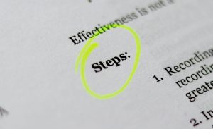 Paper with the word steps circled