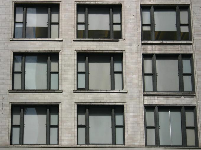 Gray wall with nine windows