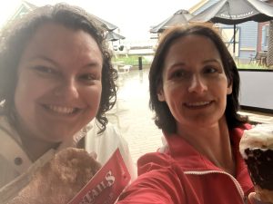 Beth and Kristy eat a dinner of beavertails and ice cream in PEI