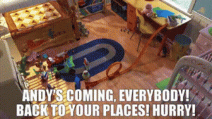 Animated gif from Toy Story where Woody yells 'Andy's coming, everybody to your places! Hurry!'