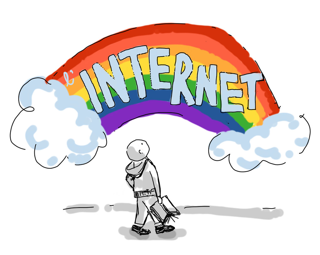person looking up at a rainbow with the word internet written on it