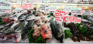 Image shows fish from a market. The odour of fish is due to a mixture of simple alkylamines.