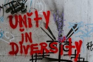 Unity in diversity spray paint on wall