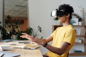 person sitting with VR glasses on