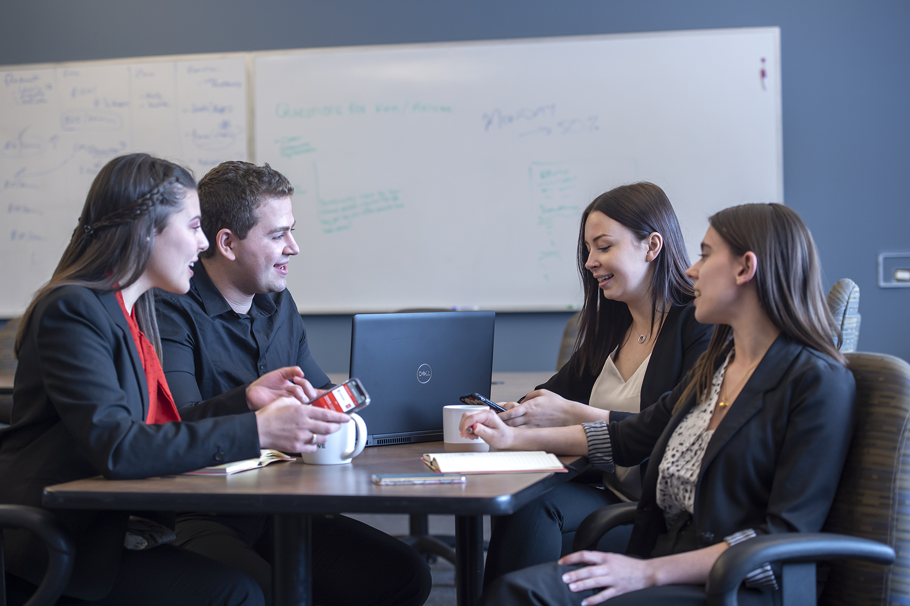 Fanshawe Business students posing on campus.