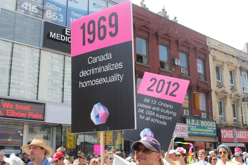 http://commons.wikimedia.org/wiki/Category:LGBT_history_in_Canada#/media/File:Marchers_at_Toronto_Pride_2014.jpg