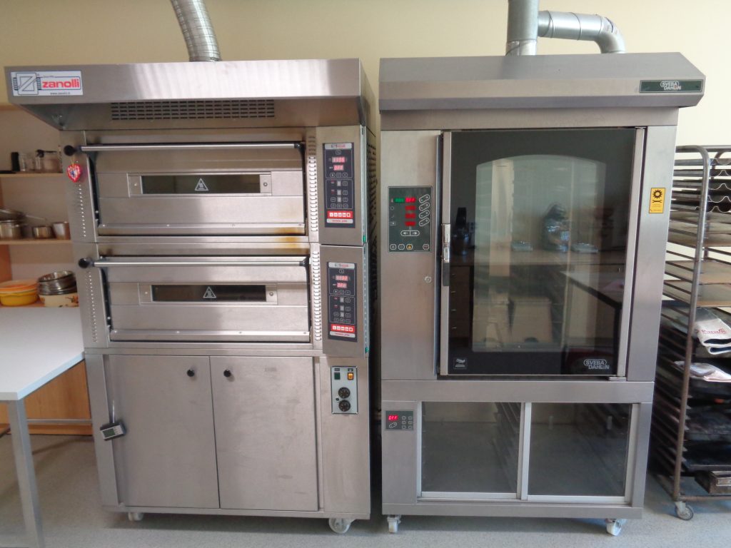 Industrial hearth deck oven and rotary rack oven is displayed.