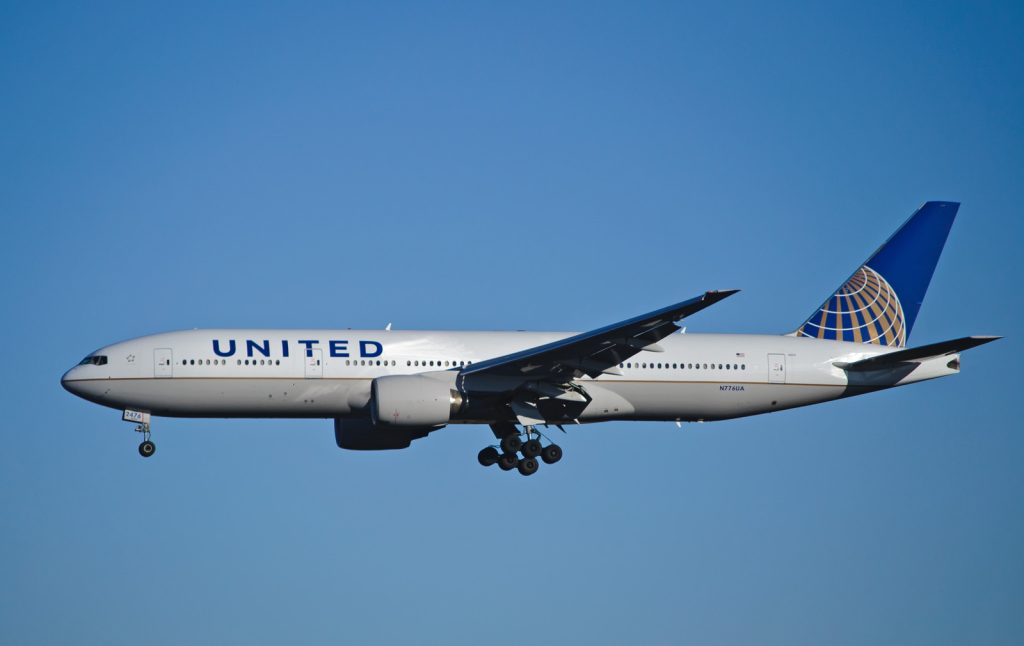 A United Airlines airplane in the air.