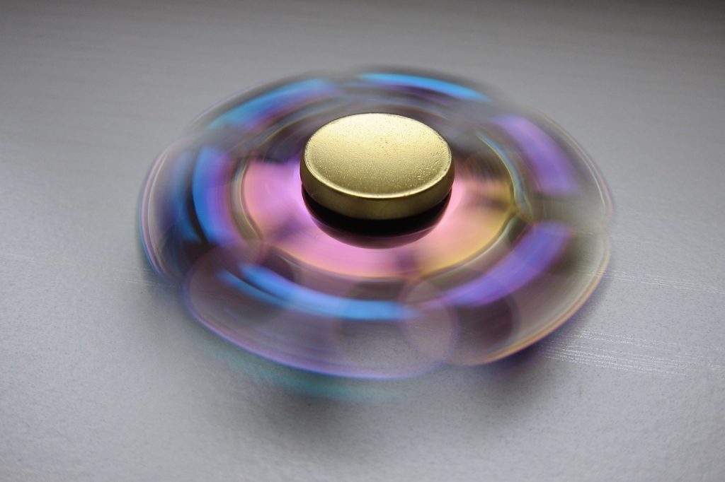 A fidget spinner spinning is shown.