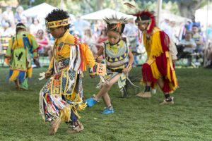 Indigenous children during a powwow