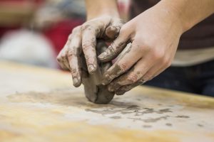 hands modling clay