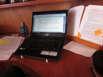 A photo of a laptop with text on the screen