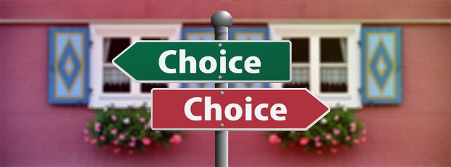 Signs pointing in opposite directions with "Choice" written on them.