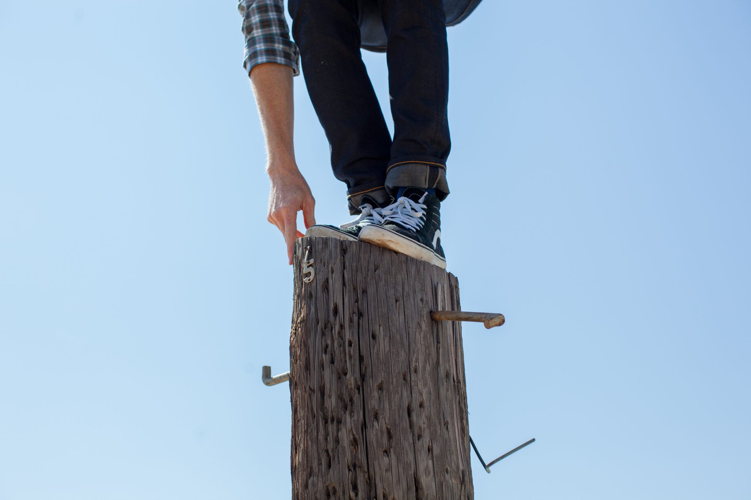 Man balancing on a pole.