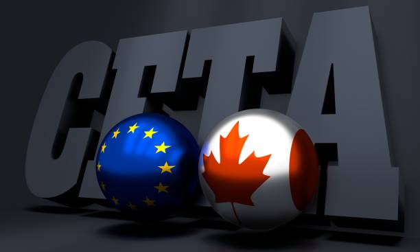 3D image of CETA that illustrates two balls at the front painted as Canadian and European Union flags and CETA in the background