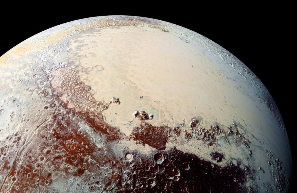 Image of a portion of the surface of Pluto. In this photograph from New Horizons, the smooth, white Sputnik plains are seen covering most of the upper right of the image. Rugged, heavily cratered terrain covers the lower centre and upper left.