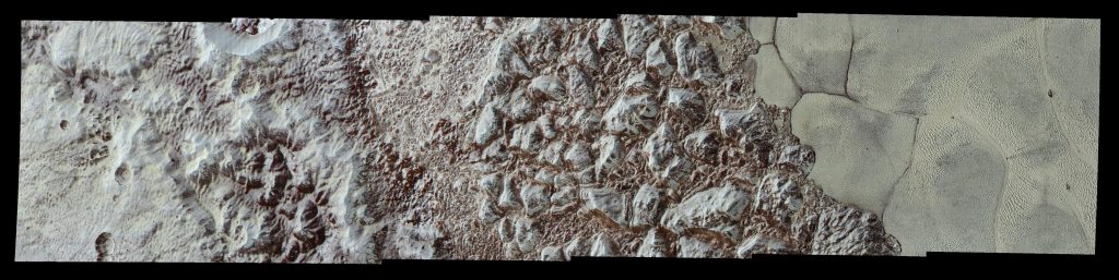 An image of a strip of Pluto’s terrain, showing an area with a few craters on the left, mountains in the centre, and a flat “sea” on the right.