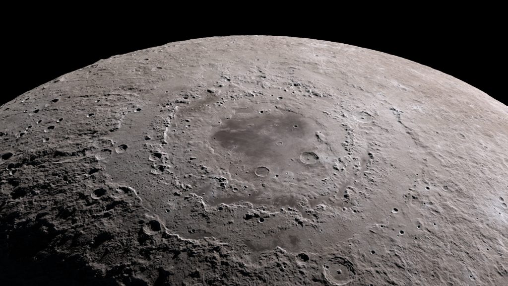 Image of Mare Orientale. A huge impact basin not seen directly from Earth, with many terraced rings extending out about 500 km from the flat, lava-filled central basin.