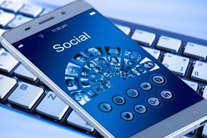 Mobile phone showing social media