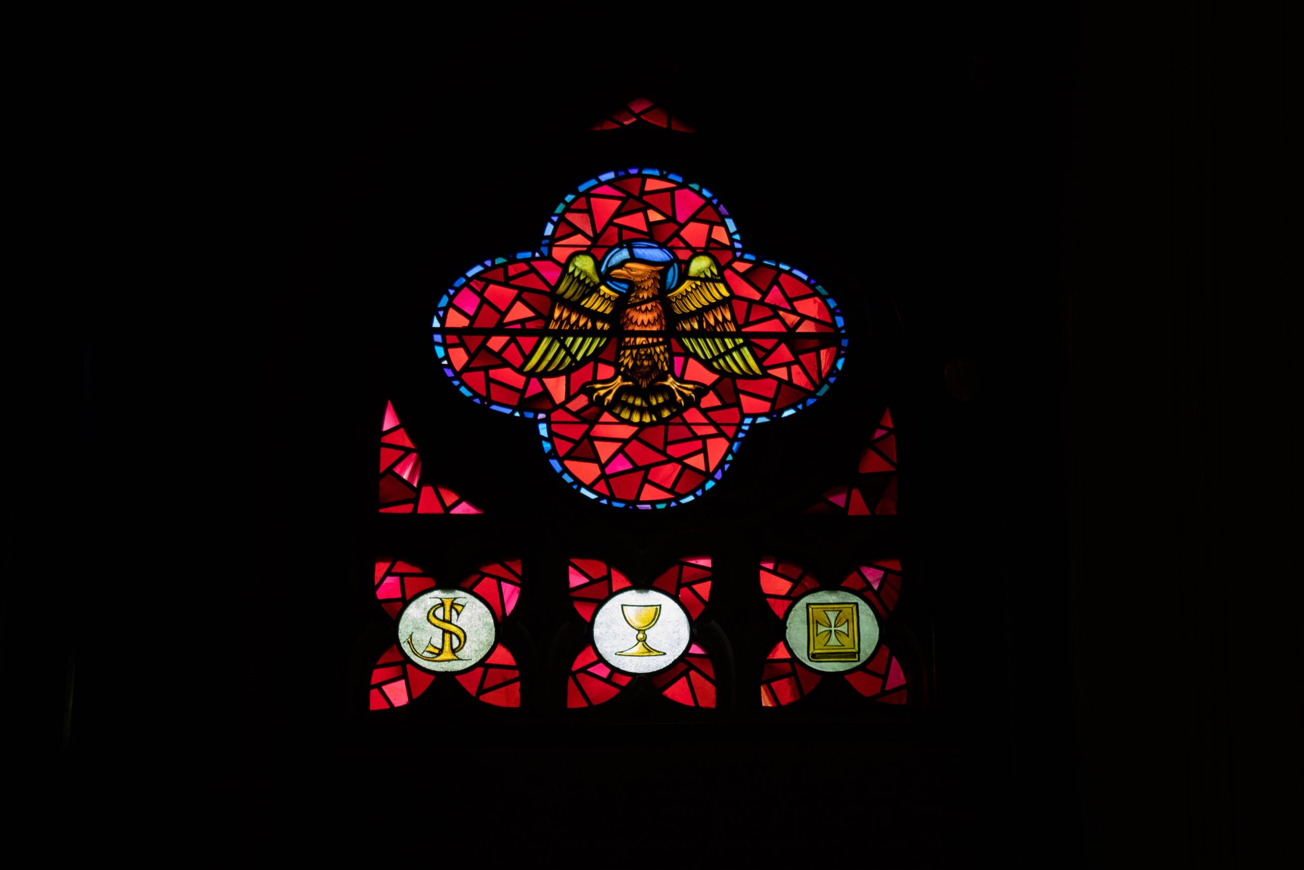 Stained glass window showing an eagle