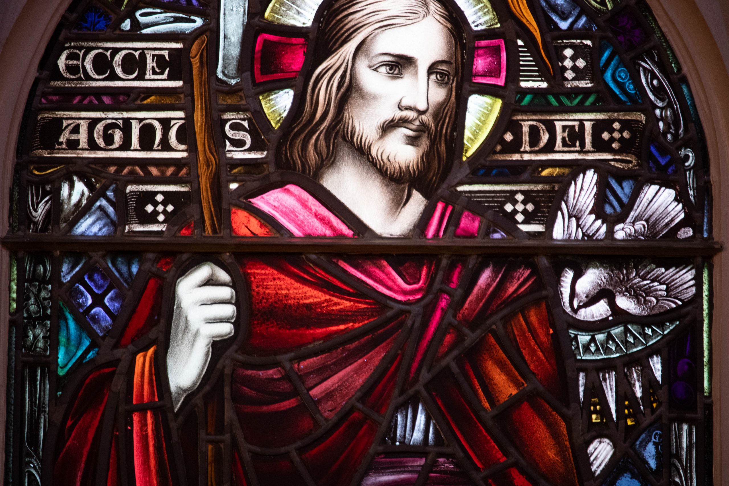 Detail of bearded man with dove.