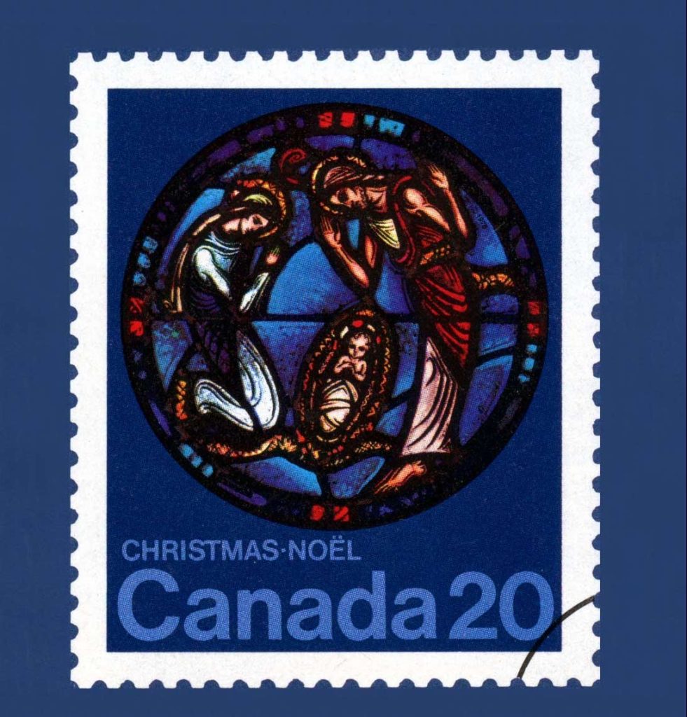 Postal stamp with recreation of stained glass window depicting a man, an infant, and a woman.