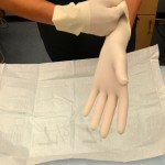 Apply sterile gloves if patient has open lesions