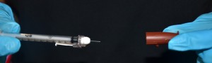 Remove needle from cap