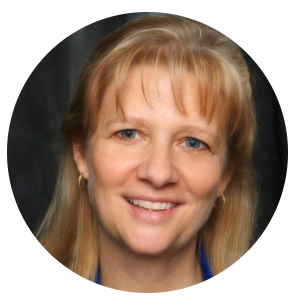 Smiling woman with long blond hair and bangs