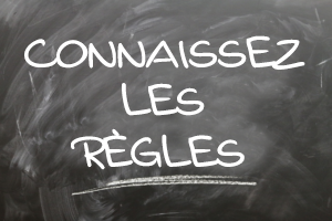 Message sur un tableau noir qui dit : « Connaissez les règles »