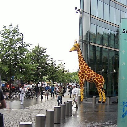 Photo of giraffe statue in downtown area