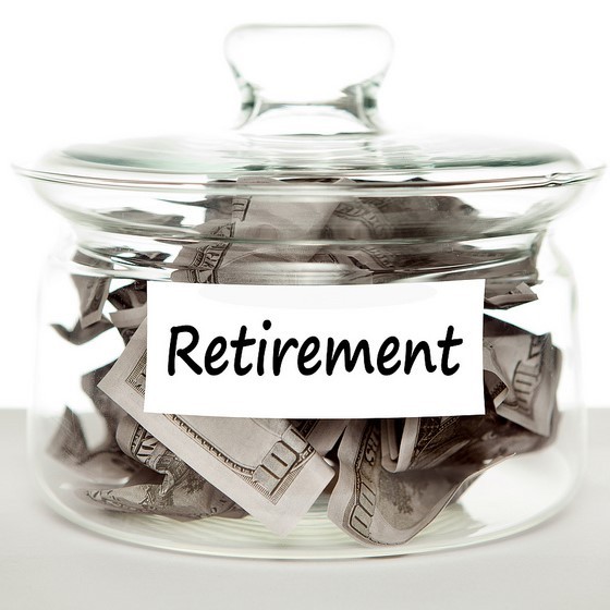 photo of a jar of money with a label that says "retirement"