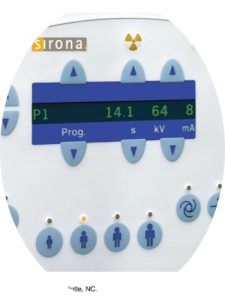 An image of the control panel on a dental X-ray machine. The display shows settings such as program mode (P1), exposure time (14.1 seconds), voltage (64 kV), and current (8 mA), with buttons to adjust these parameters. The panel includes icons for different patient positions, ensuring precise control of the X-ray imaging process.