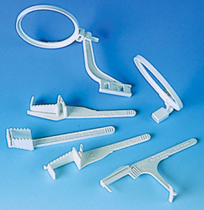 The image displays a variety of dental X-ray film holders and receptor stabilizers on a blue background.