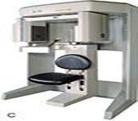 a sitting CBCT machine