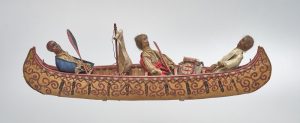 Fair Use - Model canoe with figures art - ATTRIBUTED TO) UNKNOWN (HURON-WENDAT/ABENAKI - https://www.gallery.ca/magazine/exhibitions/ancestors-stories-and-acts-of-making