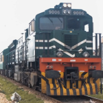 The image shows a large, powerful-looking freight train locomotive