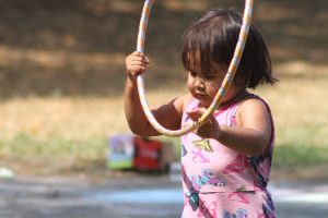 child with hoop