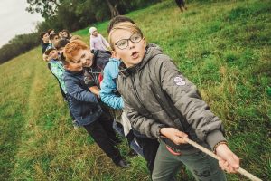 children playing tug of war